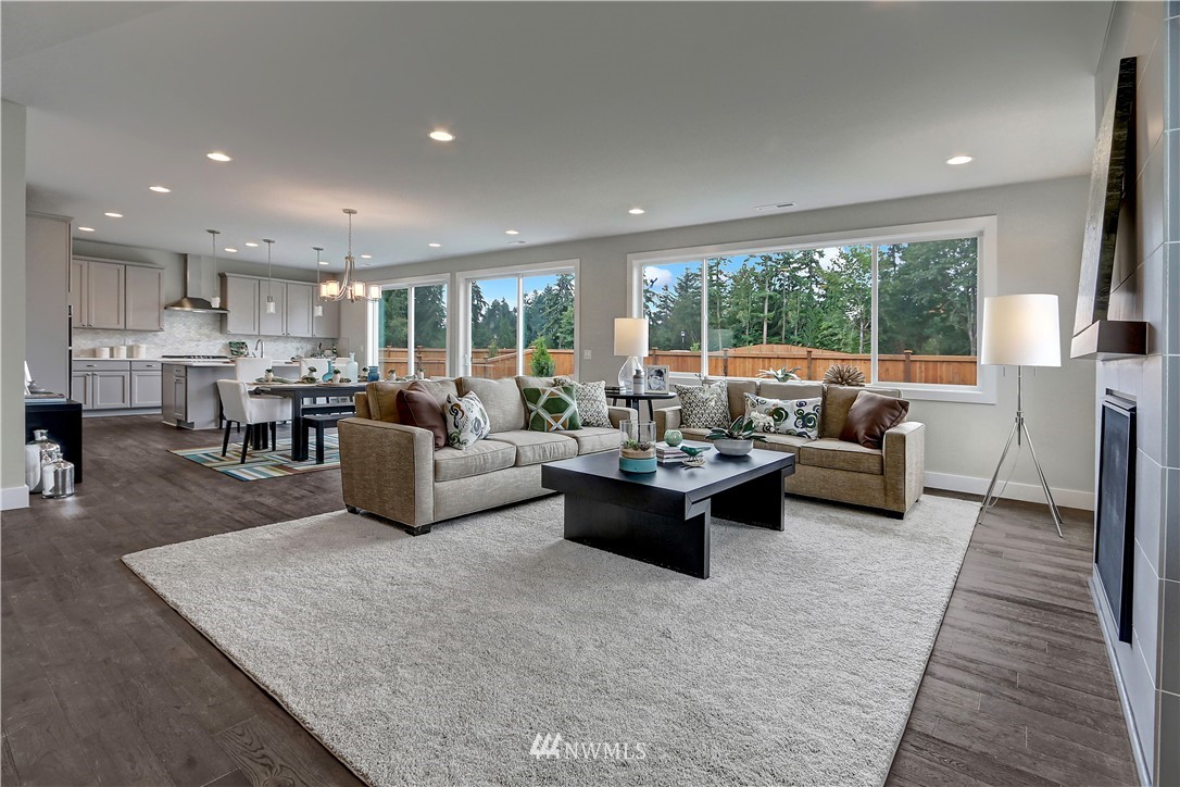 252 Field Place Southeast Renton, WA 98059 - Photo 4 of 21 a living room with furniture and a large window