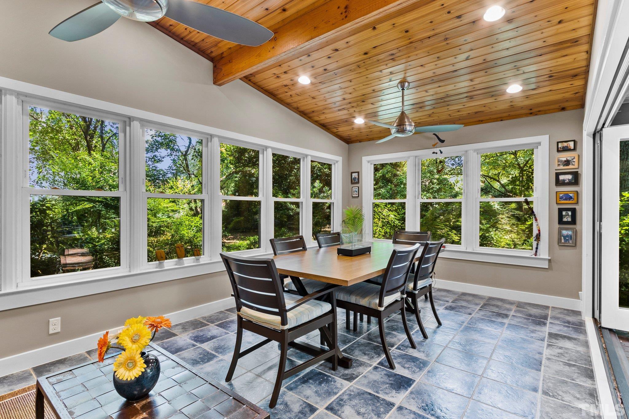 2700 Webb Street Raleigh, NC 27609 - Photo 19 of 60 a view of a dining room with furniture window and outside view