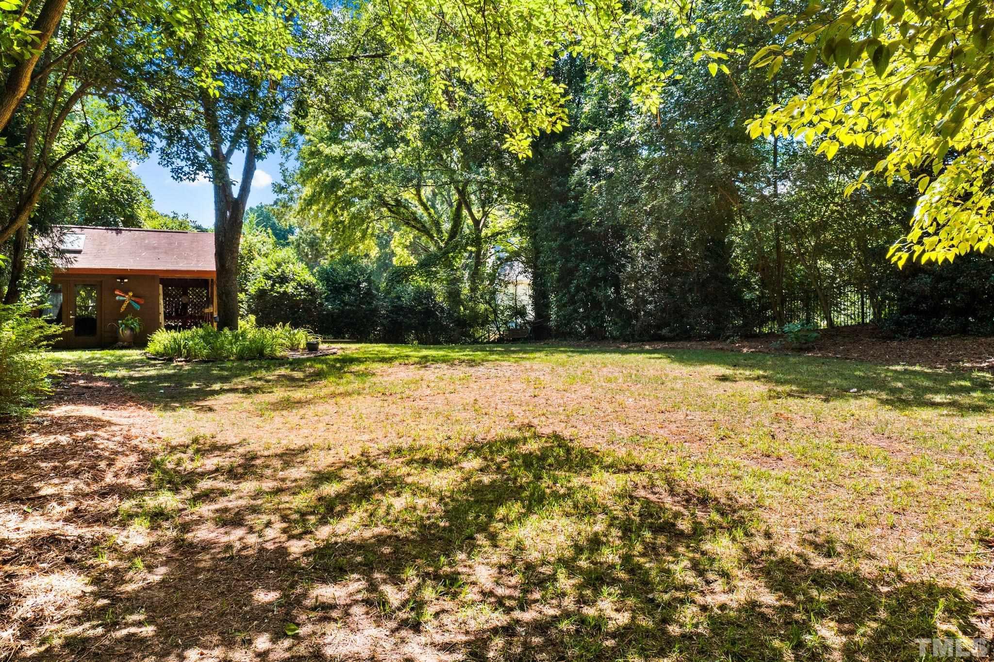 2700 Webb Street Raleigh, NC 27609 - Photo 49 of 60 a view of a house with a yard