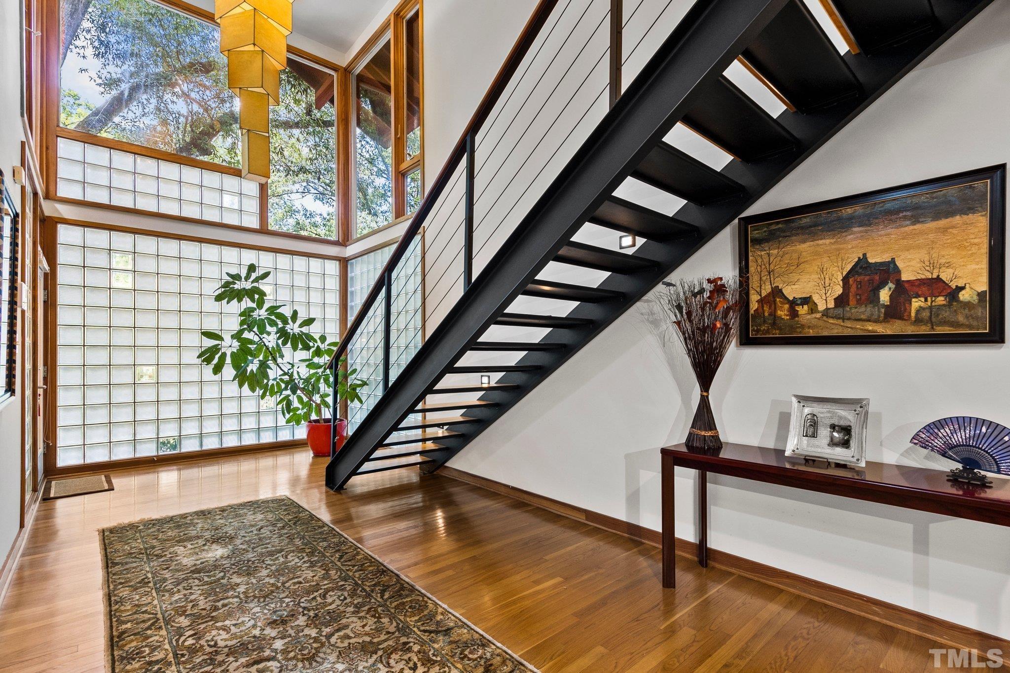 2700 Webb Street Raleigh, NC 27609 - Photo 6 of 60 a view of staircase with a rug