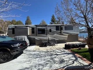 a view of a patio with a yard