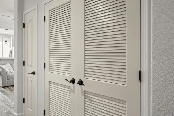 a view of a room that has a window in it