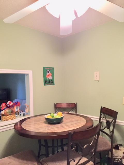 22735 Southwest 66th Avenue, Unit 105 Boca Raton, FL 33428 - Photo 11 of 25 a view of a dining room with furniture