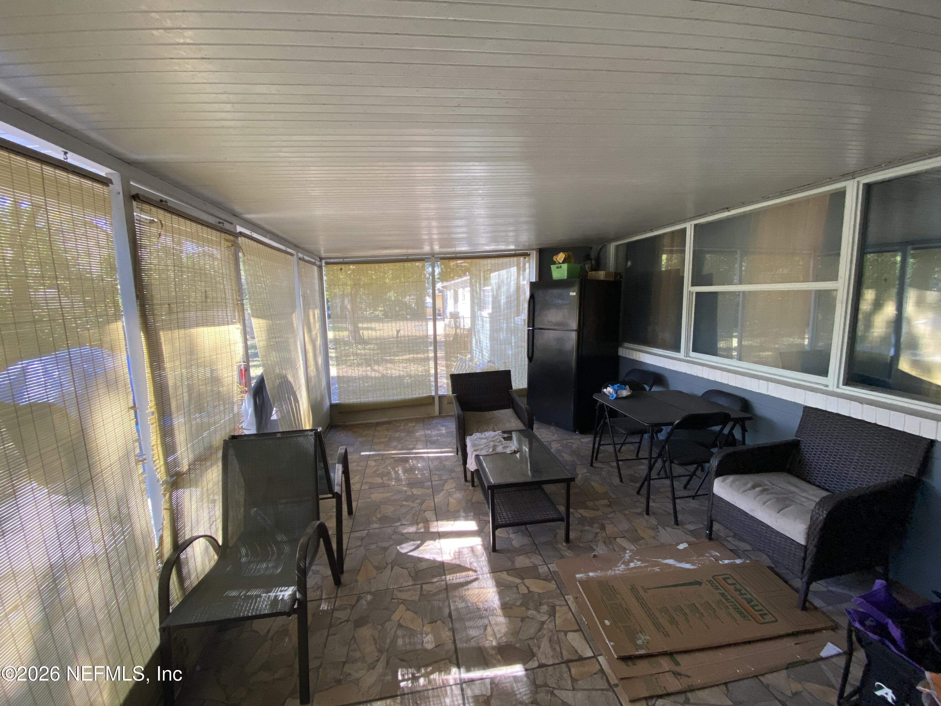 6400 Diane Road Jacksonville, FL 32277 - Photo 15 of 16 a living room filled with furniture