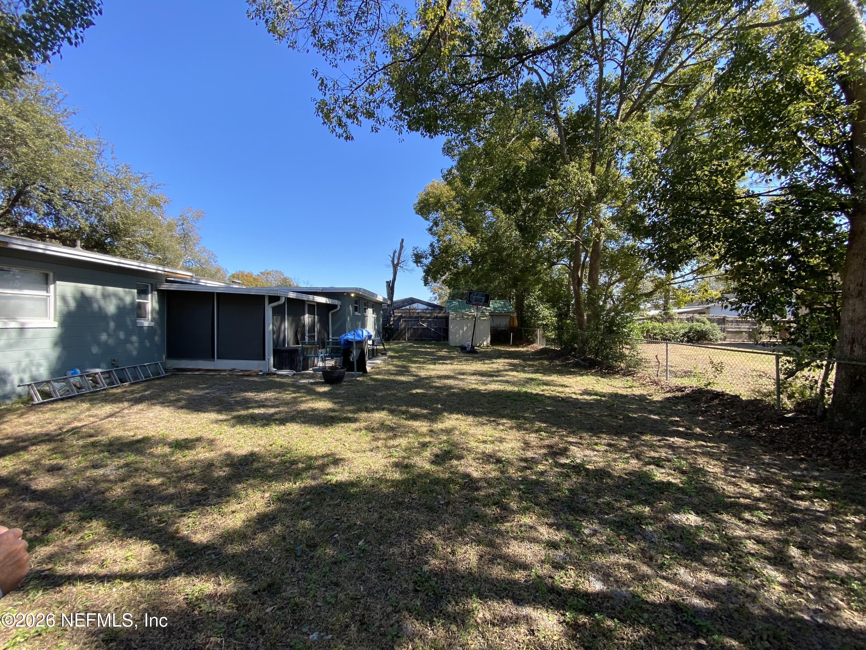 6400 Diane Road Jacksonville, FL 32277 - Photo 16 of 16 a view of a house with a yard