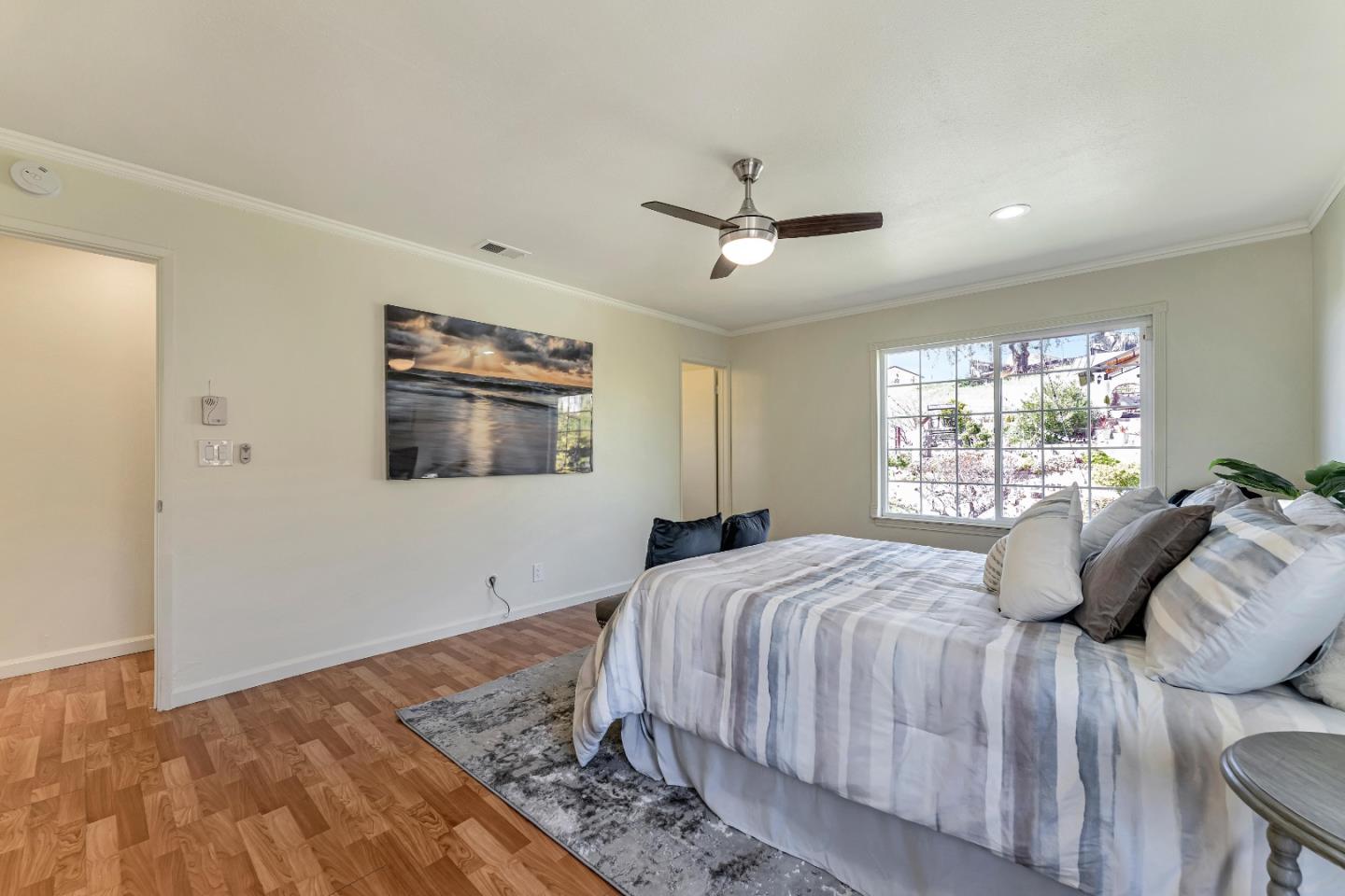175 Violet Road Hercules, CA 94547 - Photo 13 of 35 a bedroom with a large bed and a window