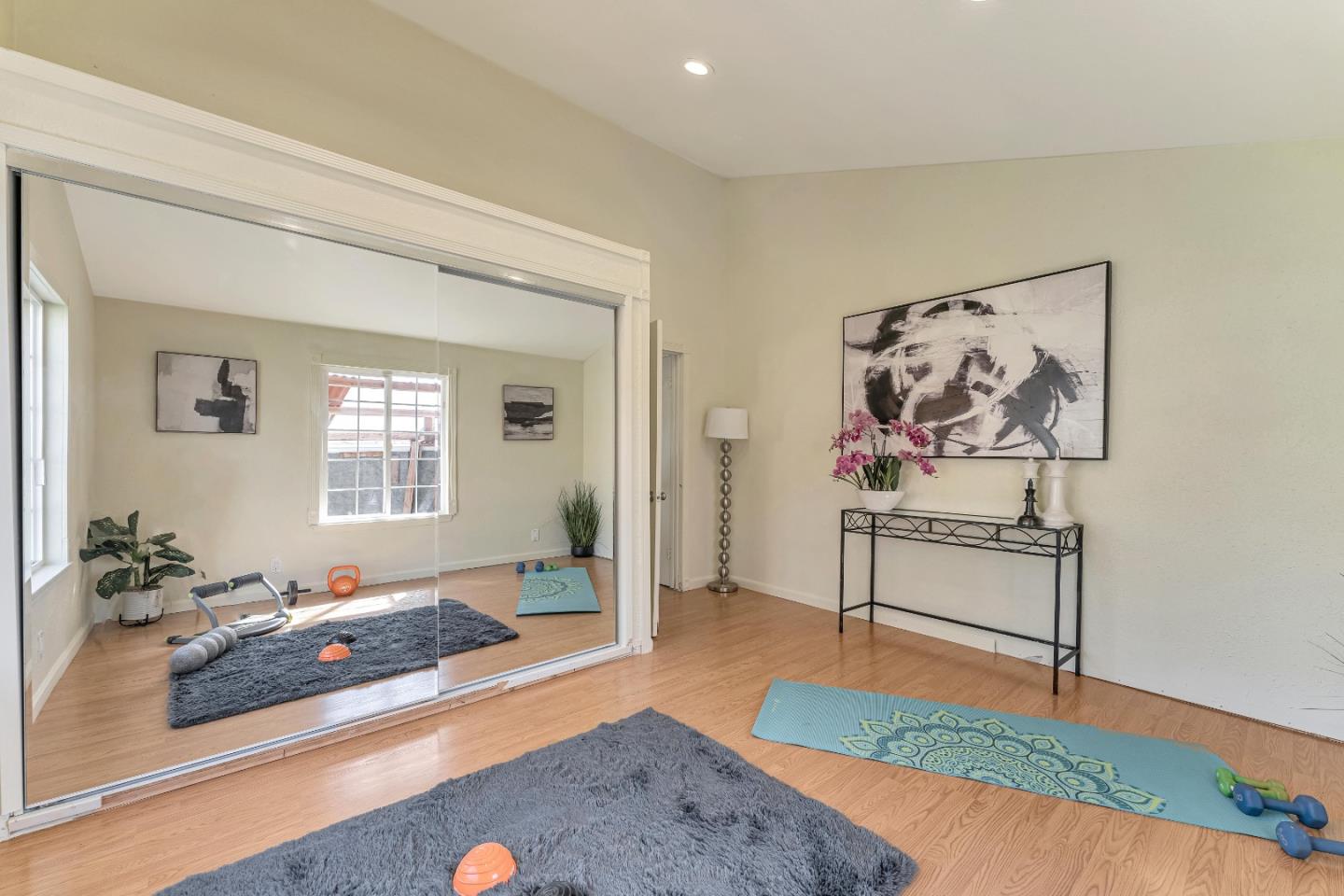 175 Violet Road Hercules, CA 94547 - Photo 19 of 35 a living room with furniture and a wooden floor