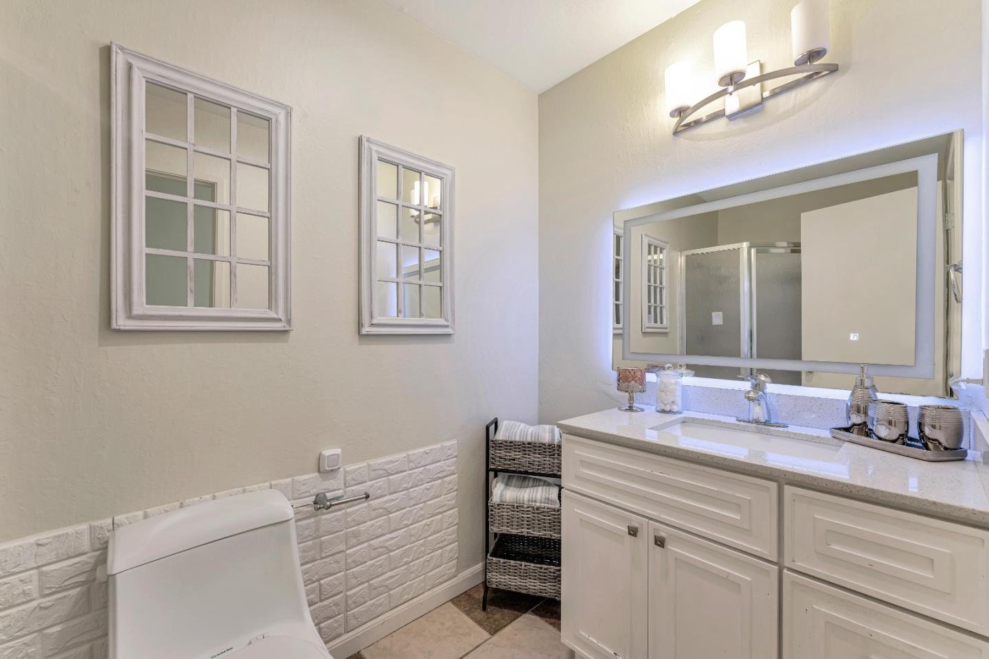 175 Violet Road Hercules, CA 94547 - Photo 22 of 35 a bathroom with a sink vanity and a mirror