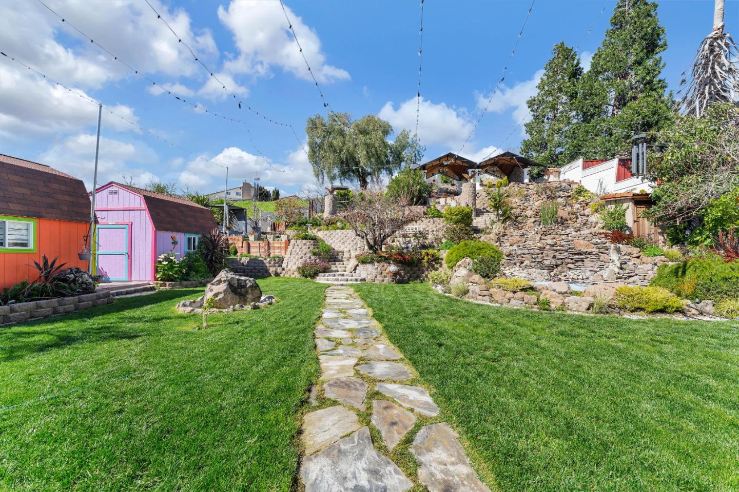 175 Violet Road Hercules, CA 94547 - Photo 25 of 35 a view of a garden with a building in the background