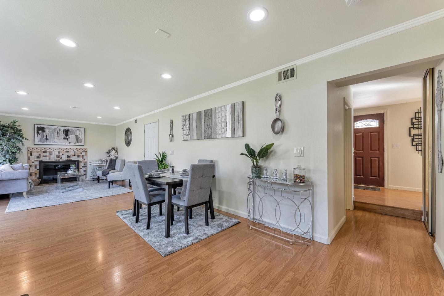 175 Violet Road Hercules, CA 94547 - Photo 6 of 35 a living room with furniture a dining table and kitchen view