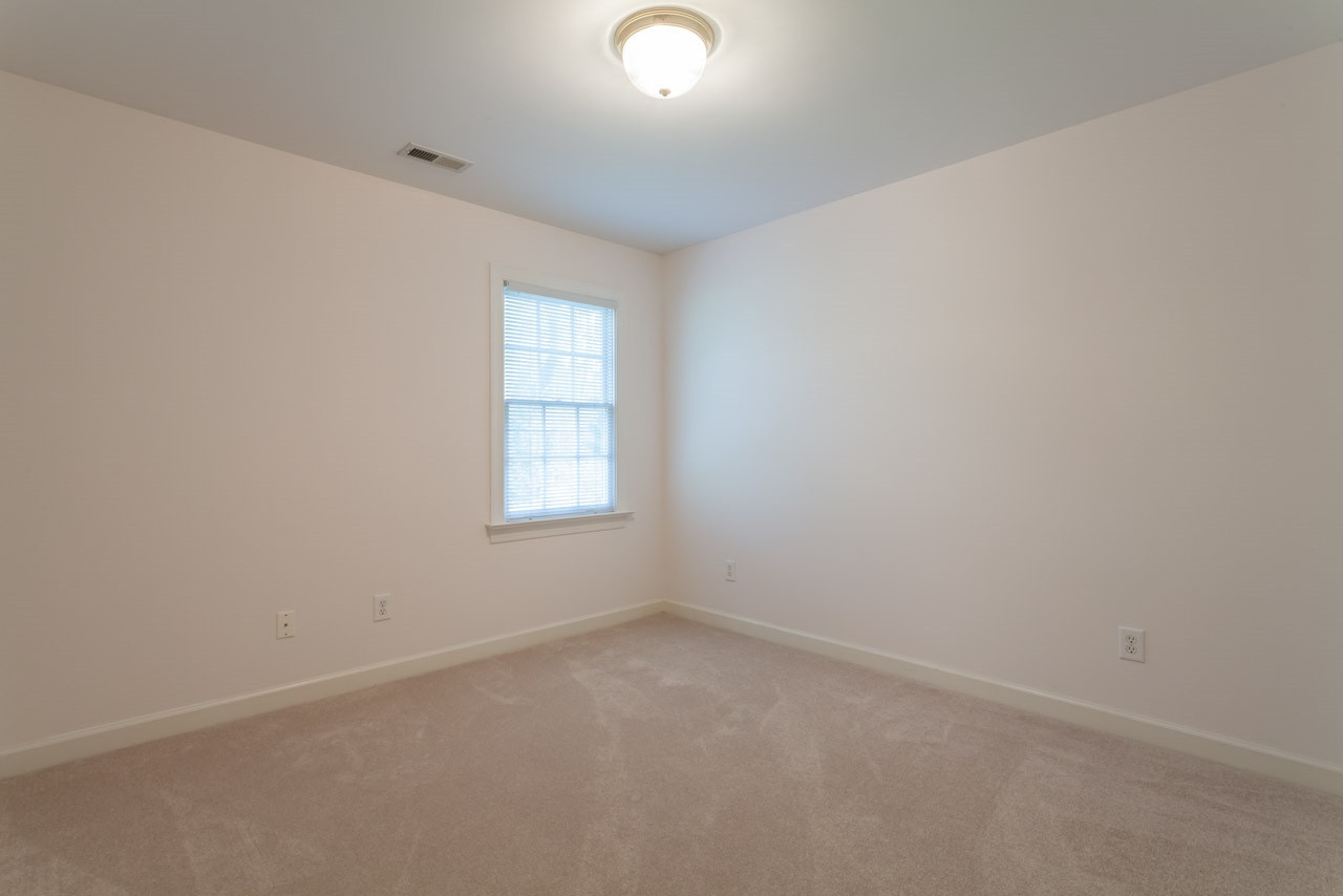 2408 Wertherson Lane Raleigh, NC 27613 - Photo 18 of 25 Secondary Bedroom