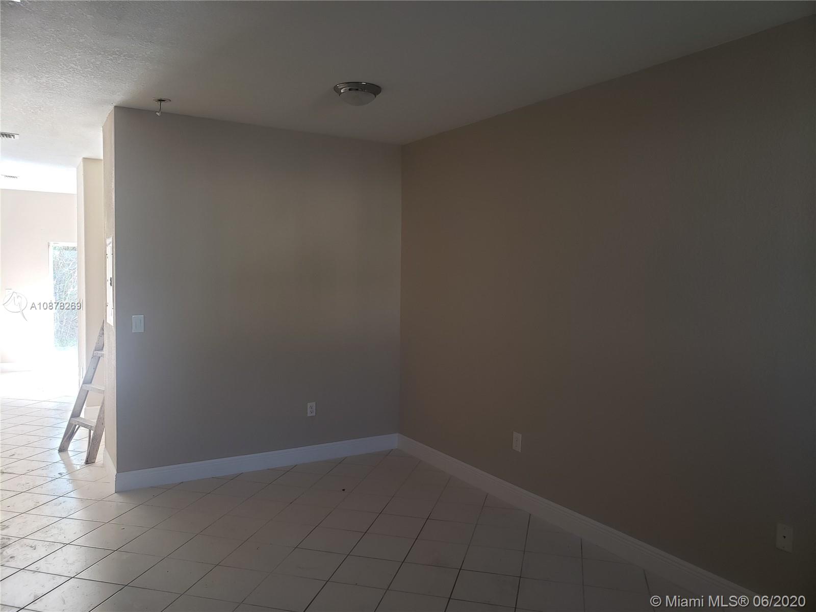 2551 Southeast 16th Terrace, Unit 104 Homestead, FL 33035 - Photo 1 of 7 a view of an empty room