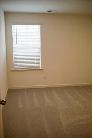 a bathroom with a shower curtain and a sink
