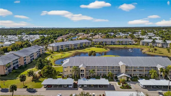 a view of a city with lawn chairs