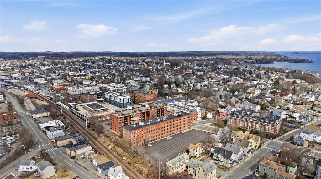 50 Rantoul Street, Unit 204 Beverly, MA 01915 - Photo 35 of 41 an aerial view of a city
