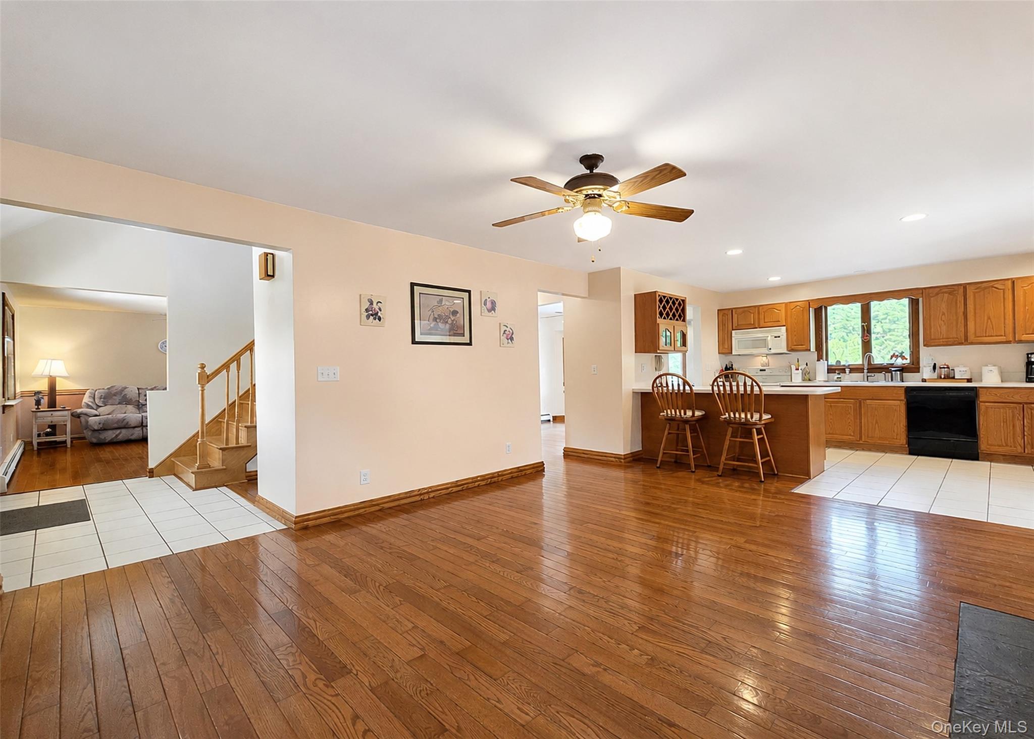 635 Farmveu Road Mattituck, NY 11952 - Photo 13 of 30 Living Room looking into dining room and family room