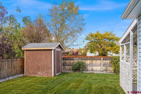 a view of a backyard with plants