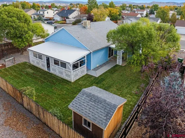 an aerial view of a house having yard
