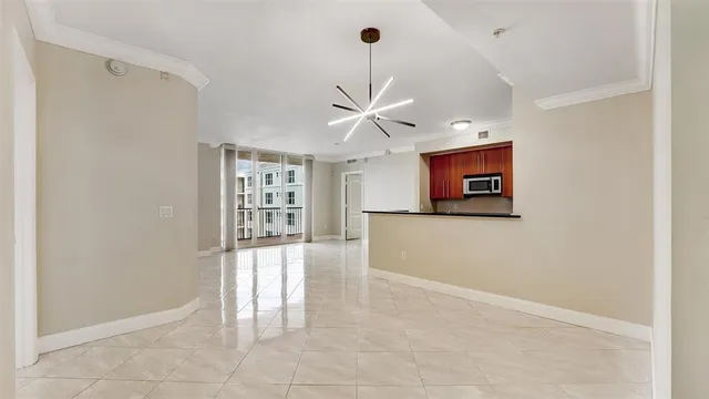 a kitchen with stainless steel appliances a refrigerator and a stove top oven