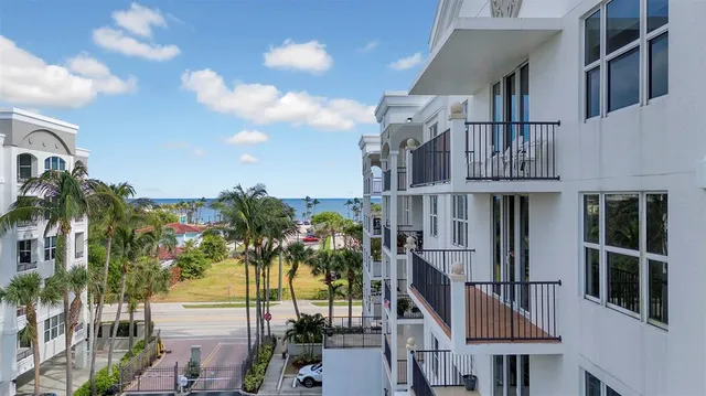 a bathroom with a sink and glass door