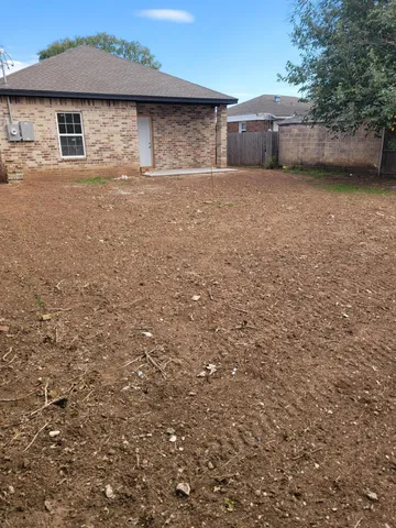 a front view of house with yard