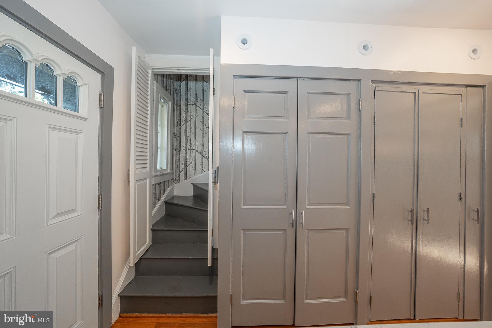 108 South Spring Mill Road Villanova, PA 19085 - Photo 13 of 53 a view of a hallway with wooden floor and staircase