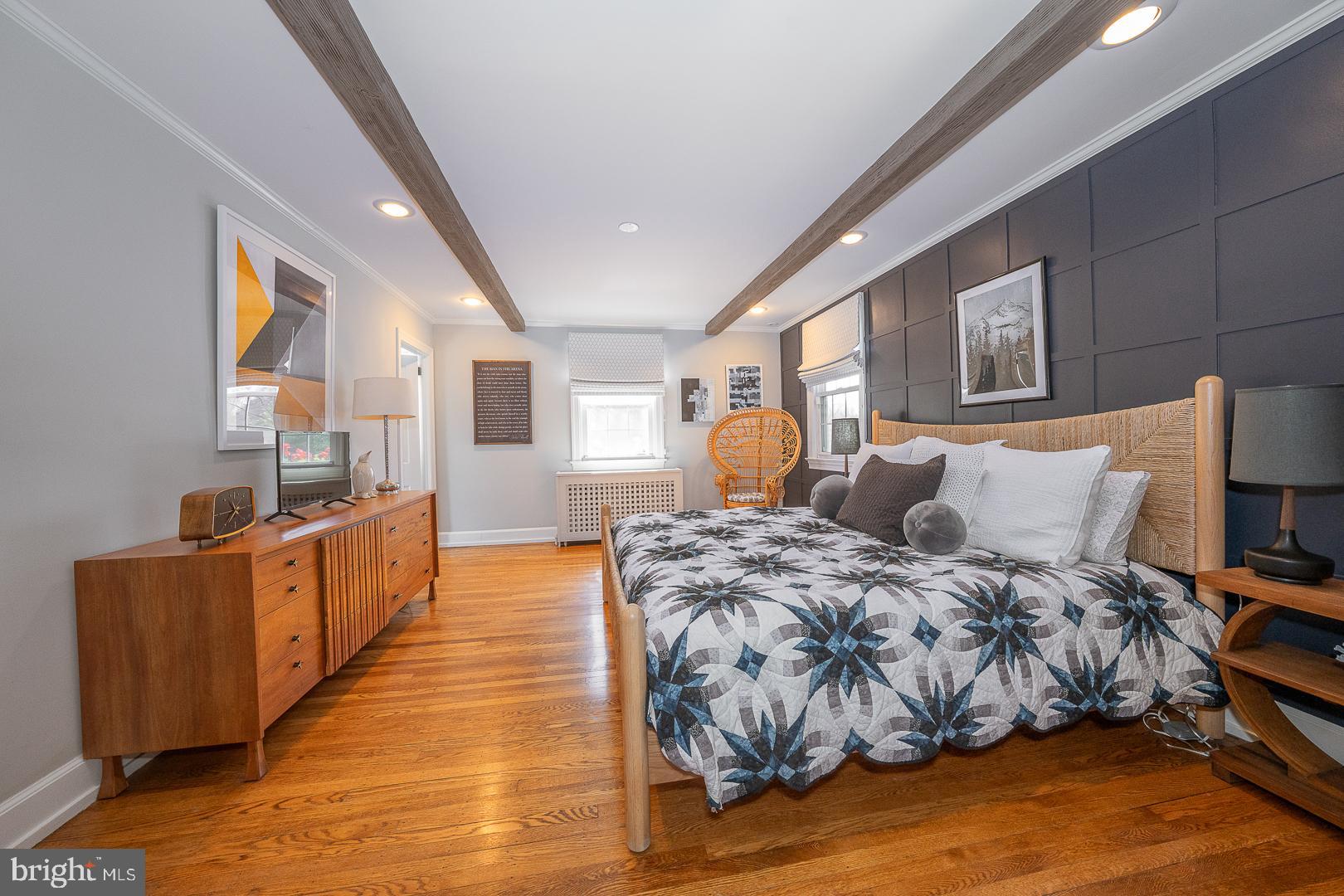 108 South Spring Mill Road Villanova, PA 19085 - Photo 20 of 53 a large bedroom with bed and wooden floor
