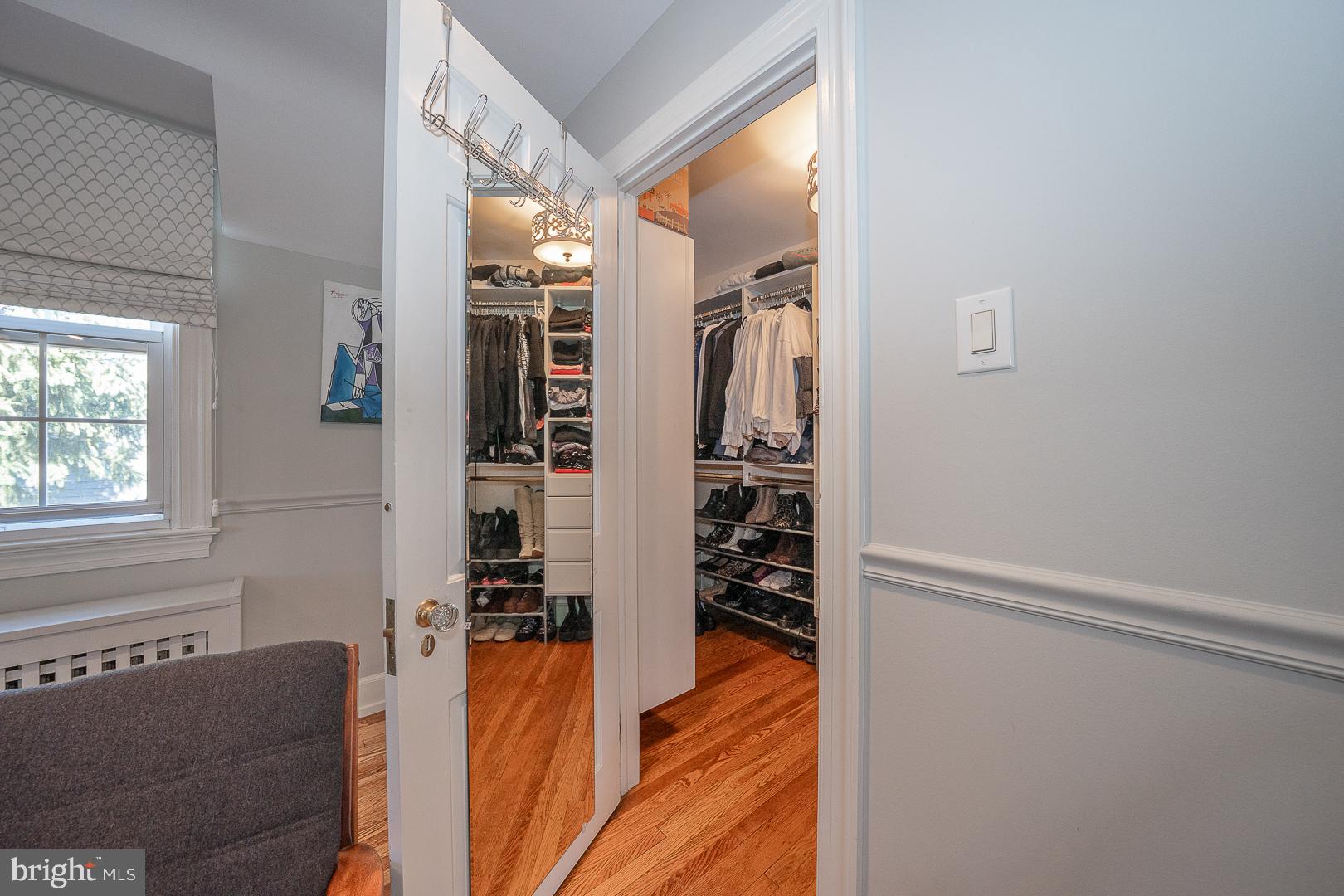 108 South Spring Mill Road Villanova, PA 19085 - Photo 22 of 53 a view of walk in closet with clothes and shoes