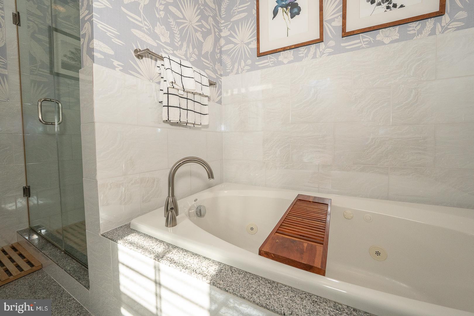 108 South Spring Mill Road Villanova, PA 19085 - Photo 25 of 53 a bathroom with a sink and a shower