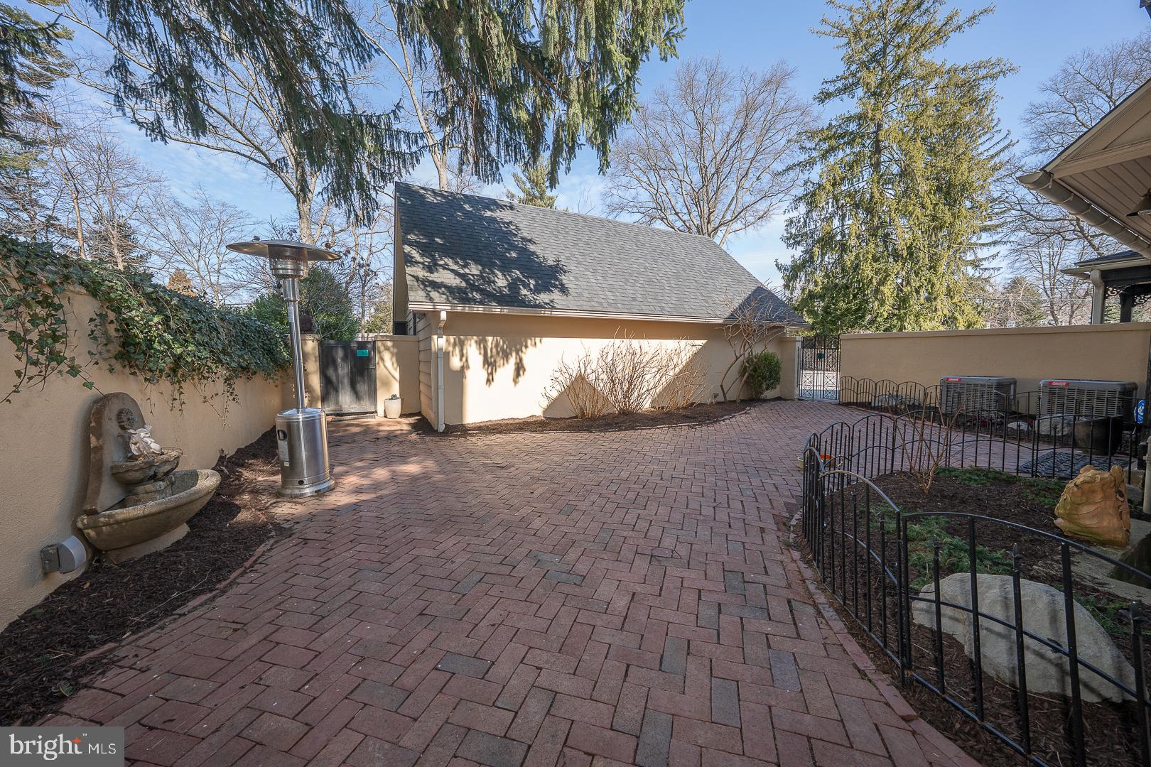 108 South Spring Mill Road Villanova, PA 19085 - Photo 39 of 53 a view of a house with backyard and sitting area