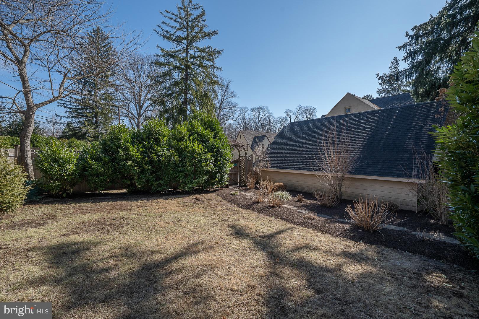 108 South Spring Mill Road Villanova, PA 19085 - Photo 50 of 53 a view of a house with a yard and sitting area