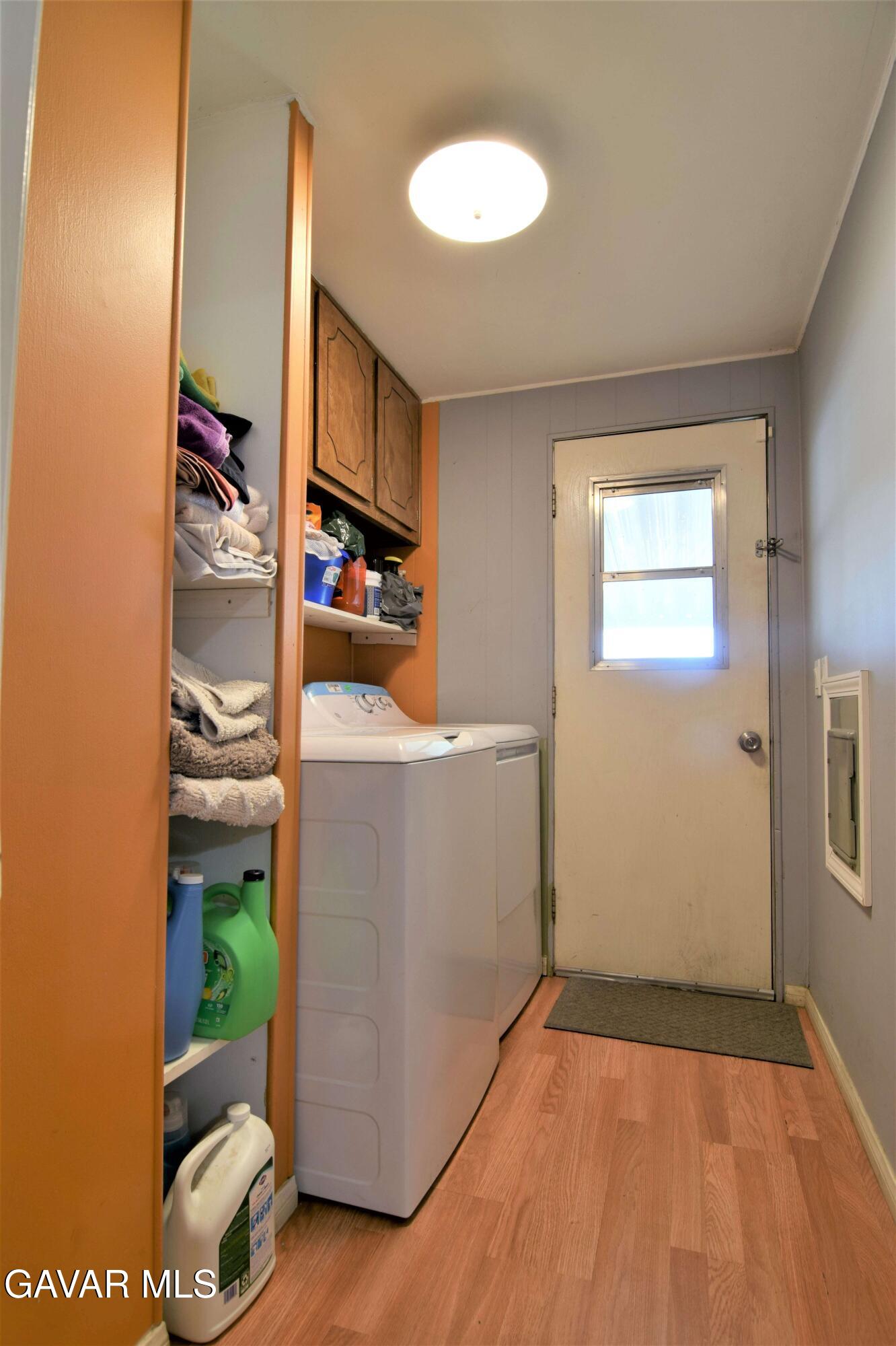 45446 7th Street East Lancaster, CA 93535 - Photo 20 of 21 a view of a room with wooden floor and window