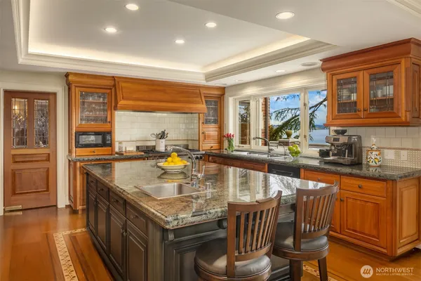 a kitchen with sink and window