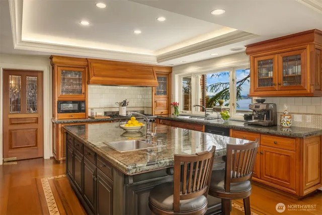 a kitchen with sink and window