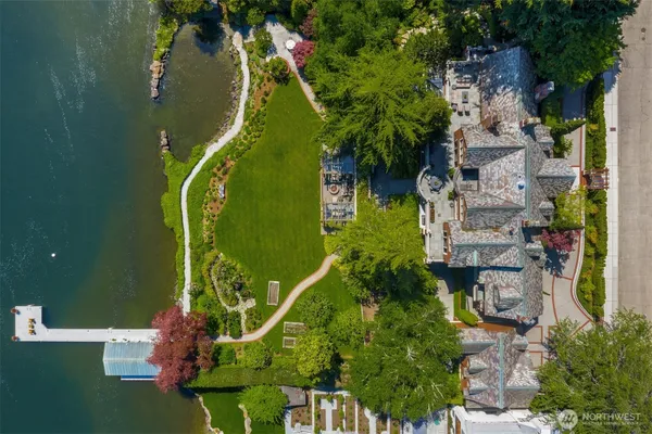an aerial view of a house with a garden