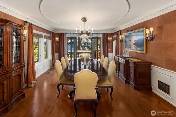 a view of a livingroom with furniture window and wooden floor