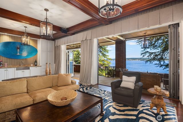 a outdoor space with patio couches and a potted plant