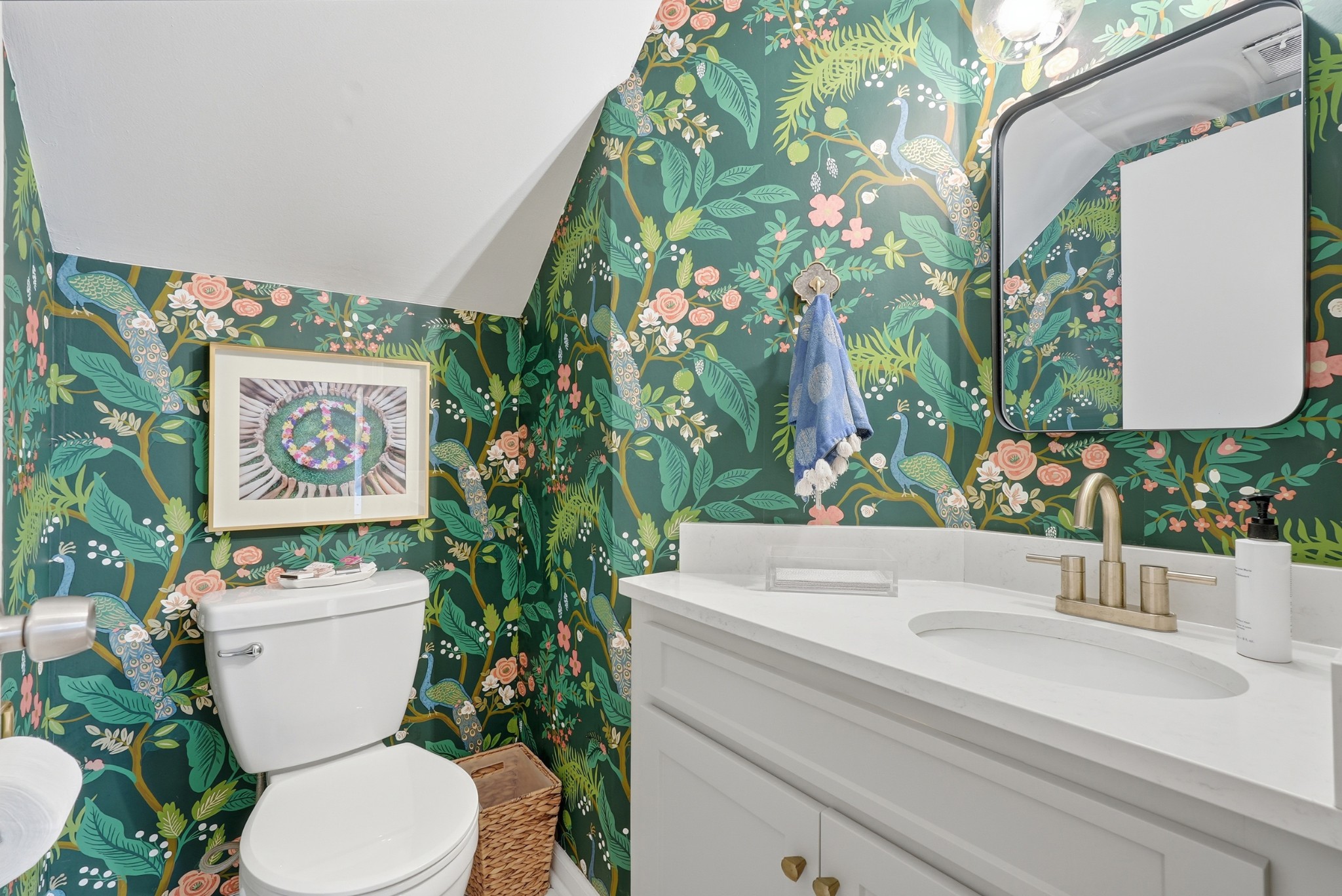 2821 Hazelwood Drive Nashville, TN 37212 - Photo 12 of 32 a bathroom with a toilet sink and mirror