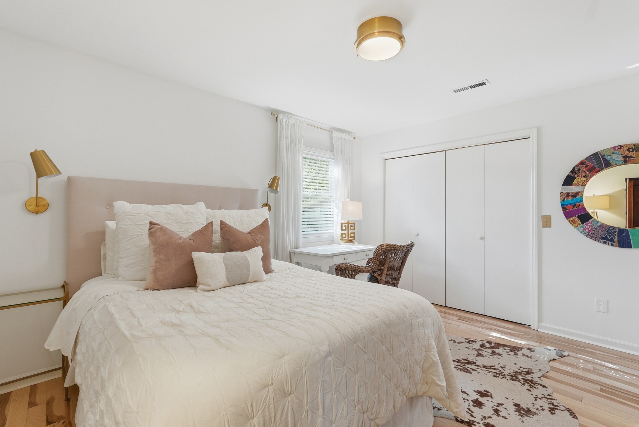 2821 Hazelwood Drive Nashville, TN 37212 - Photo 18 of 32 a bedroom with bed and wooden floor