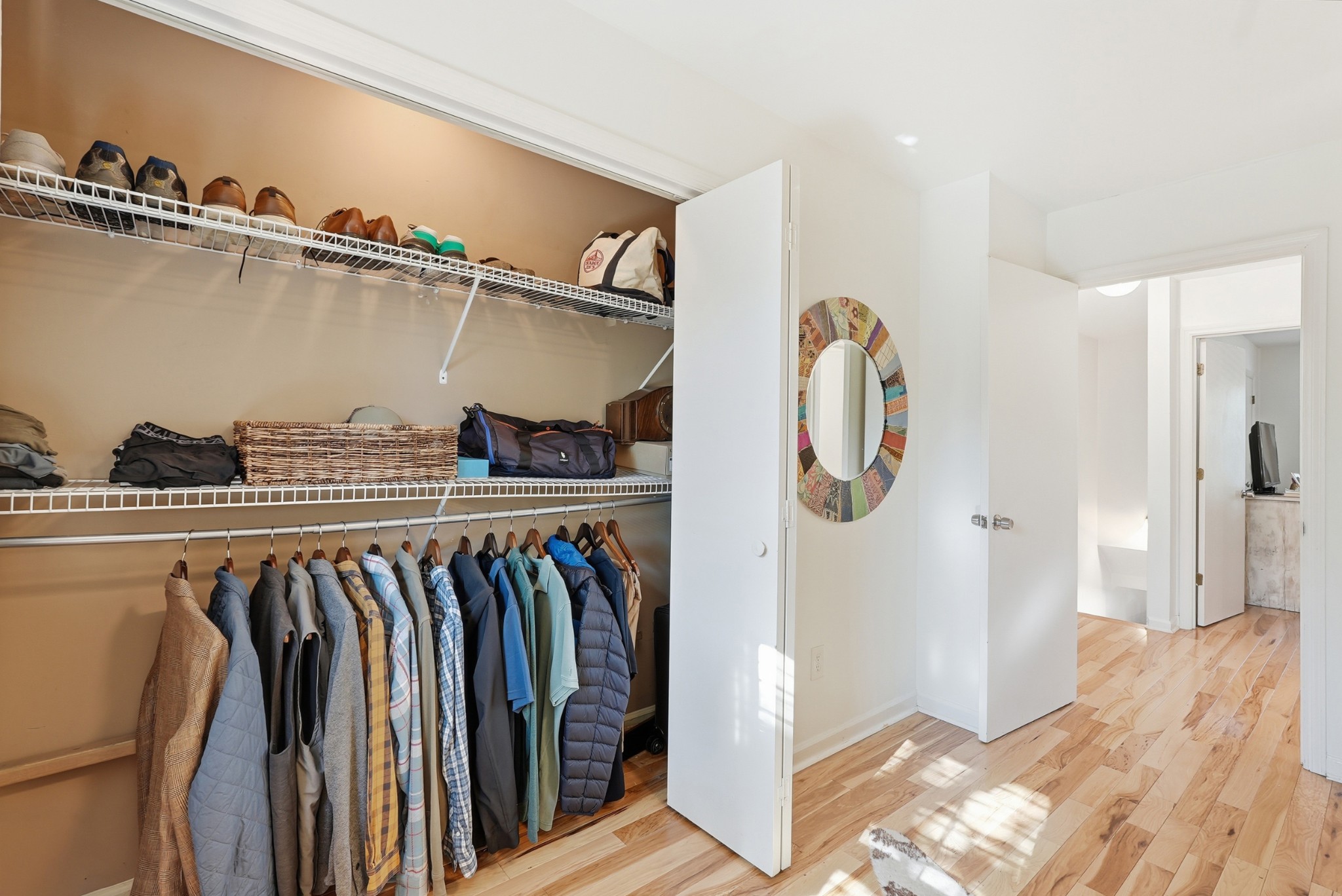 2821 Hazelwood Drive Nashville, TN 37212 - Photo 20 of 32 a view of walk in closet with clothes and shoes