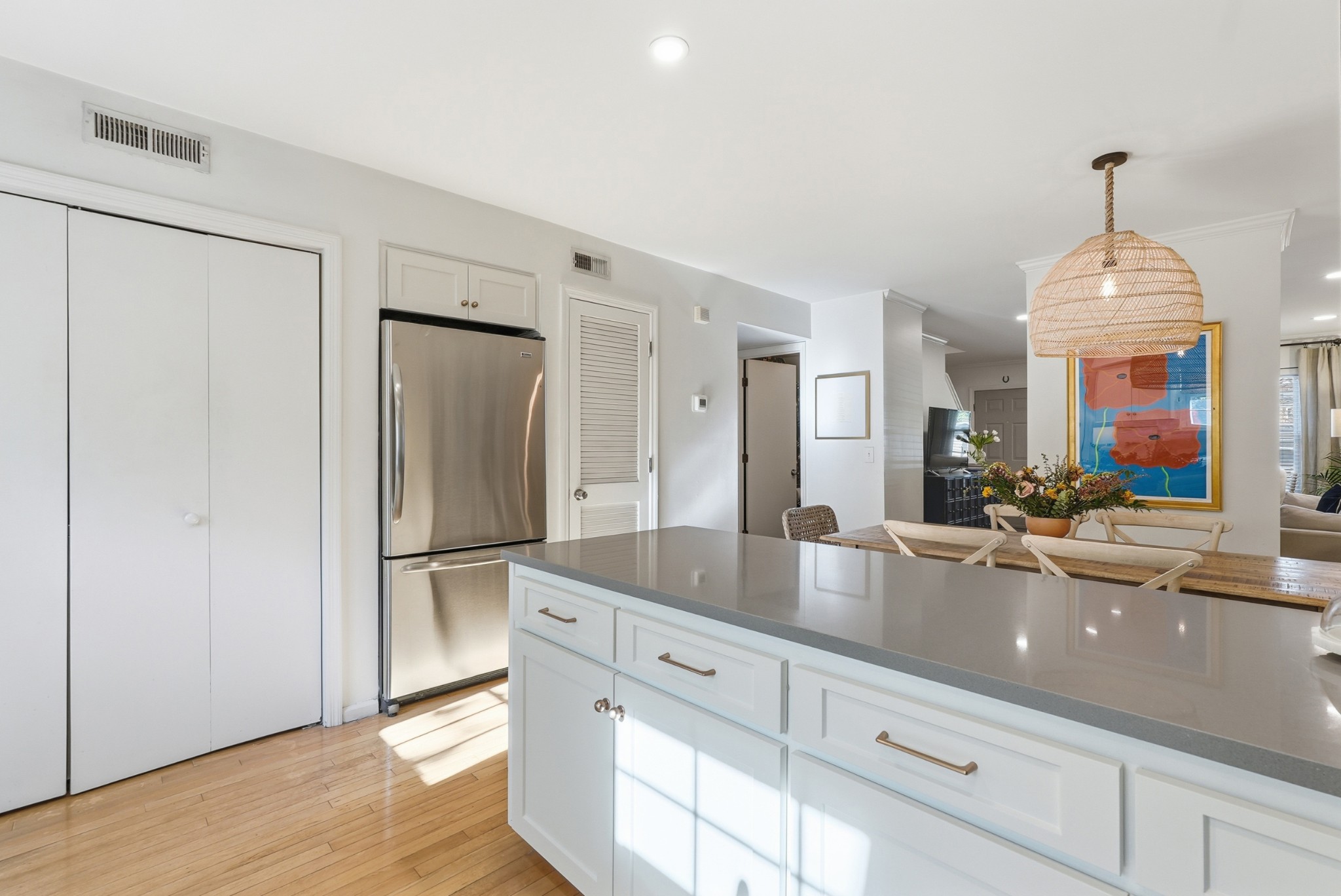 2821 Hazelwood Drive Nashville, TN 37212 - Photo 10 of 32 a view of a kitchen with kitchen island a counter top space stainless steel appliances and a window