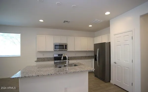 a view of a backyard with pool