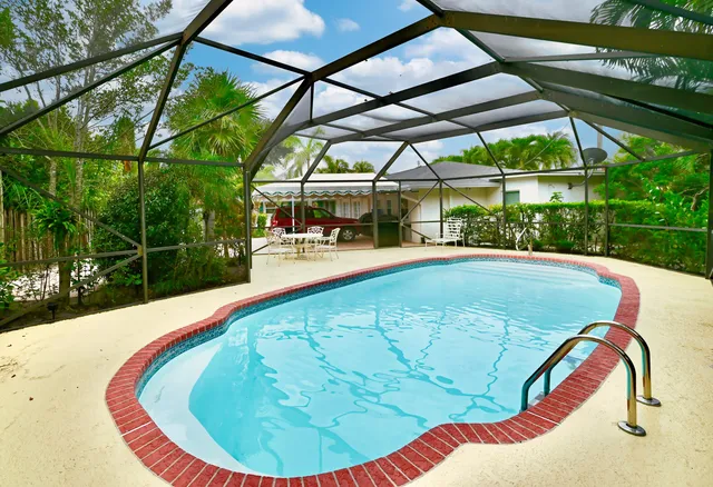 a view of outdoor space swimming pool and outdoor seating