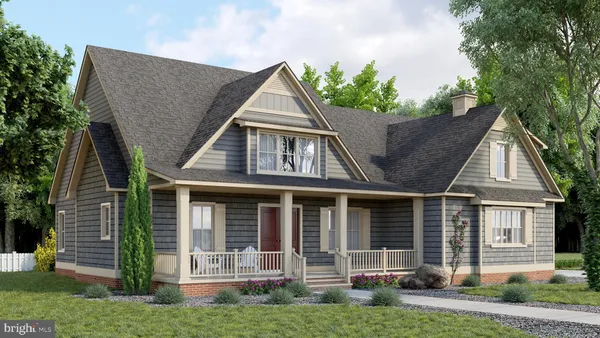 a view of house with a yard