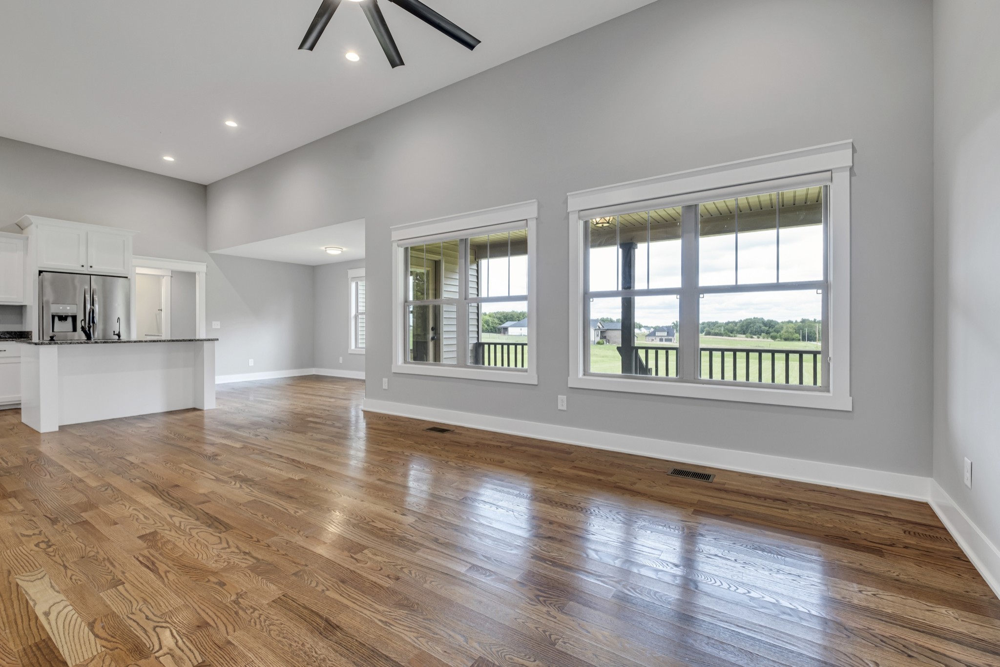 724 White Road Portland, TN 37148 - Photo 8 of 32 a view of an empty room with window and wooden floor