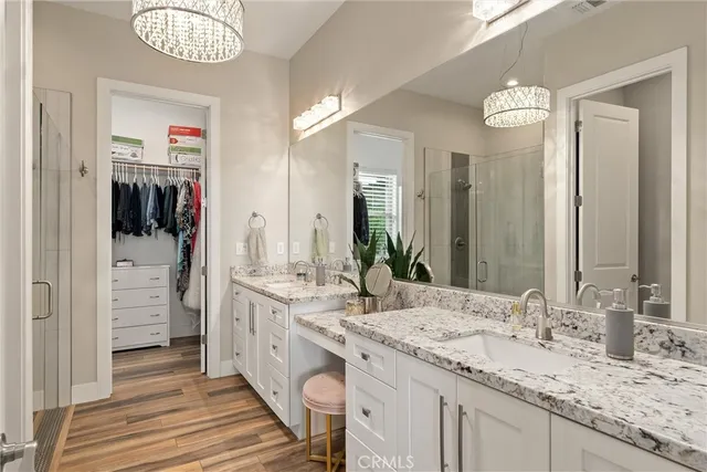 a view of a porch with furniture and a backyard