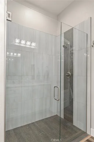 a couple of chairs sitting in a roof deck