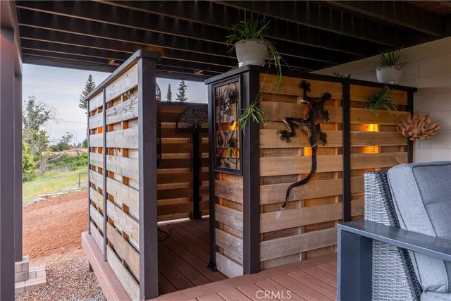 a view of a balcony with lake view and mountain view