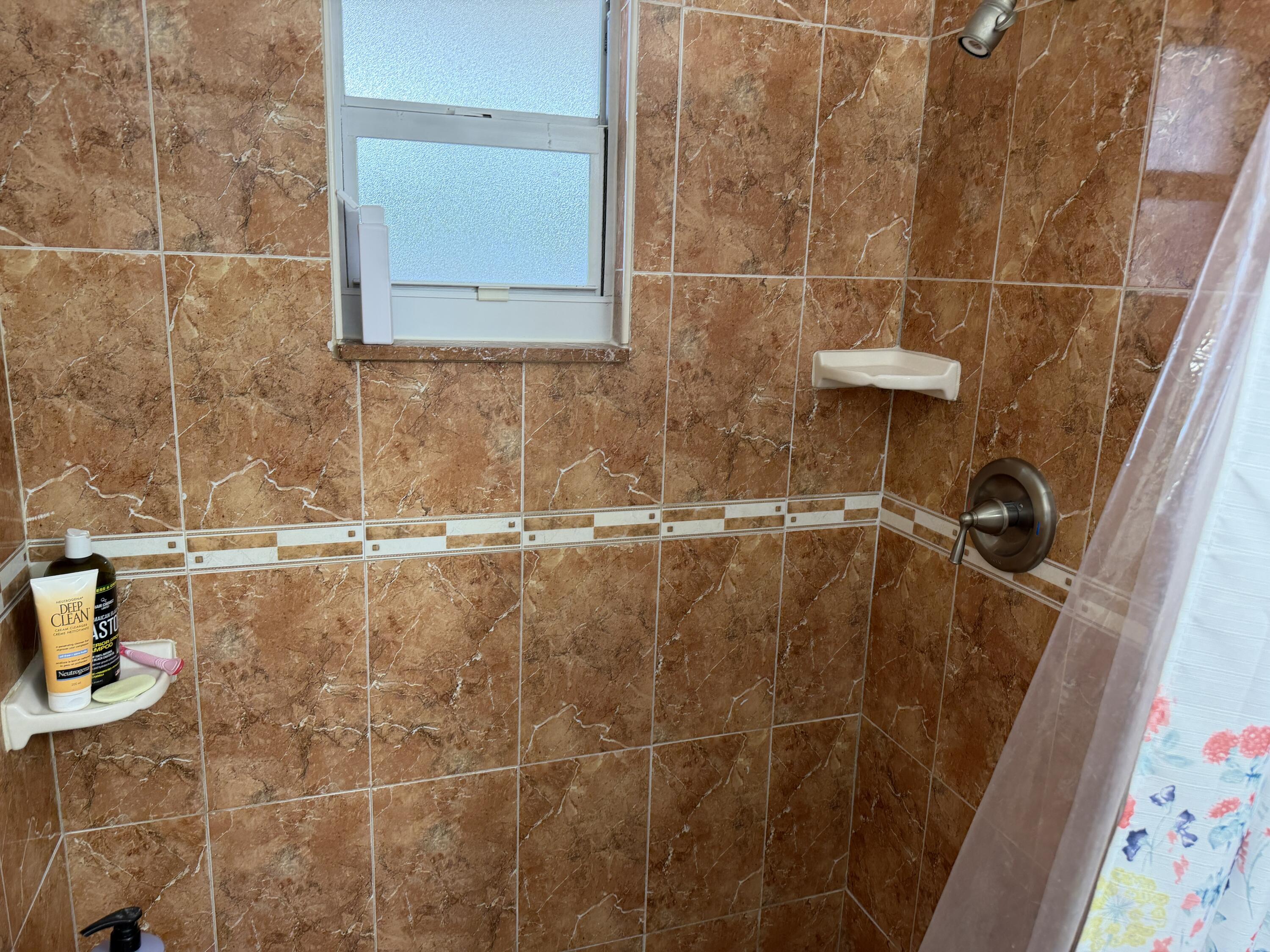 506 Davis Road, Unit 6 Palm Springs, FL 33461 - Photo 19 of 61 a bathroom with a shower