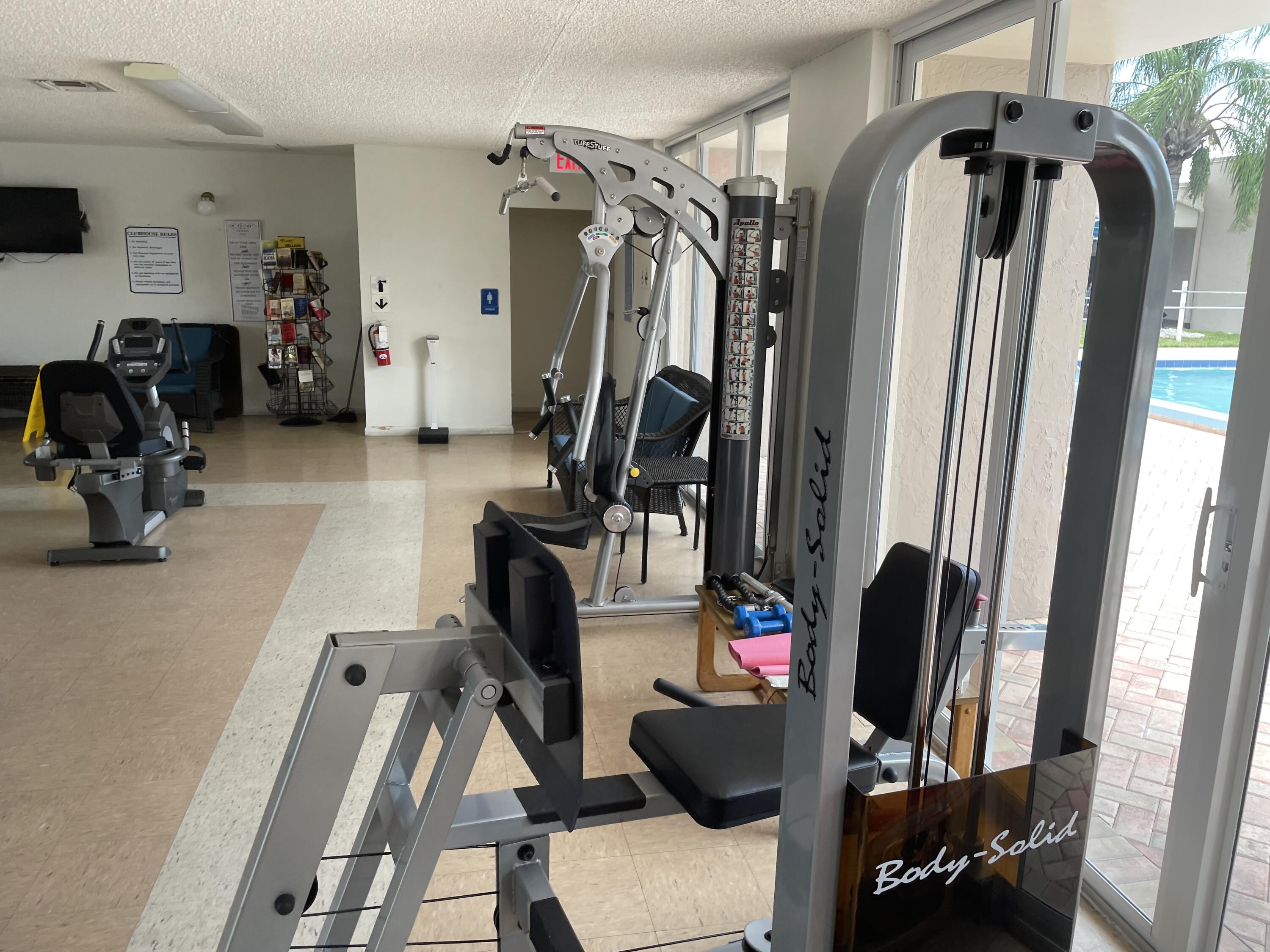 506 Davis Road, Unit 6 Palm Springs, FL 33461 - Photo 42 of 61 a view of a room with gym equipment